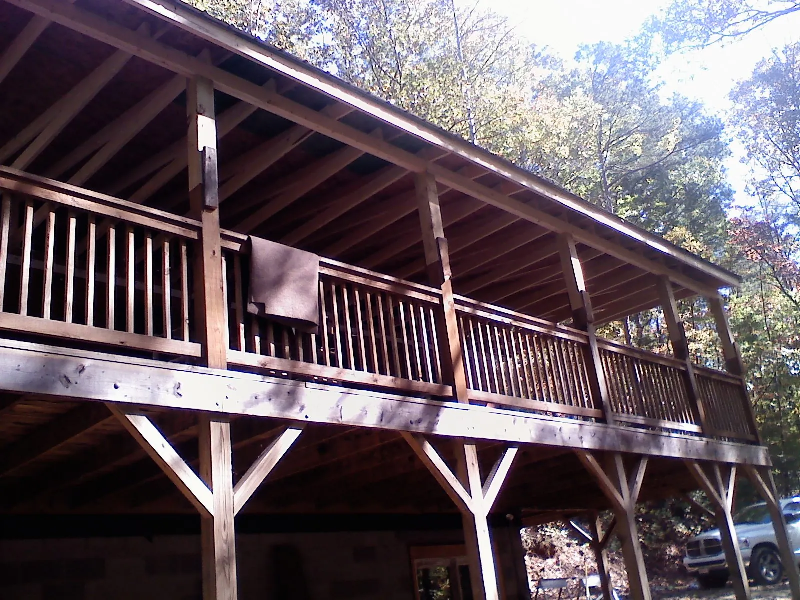Timber framing under a new elevated porch and deck — Roof Leak Repair in Muncie by Roofing Brothers